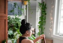 정신 건강과 운동: 우울증 완화를 위한 최적의 운동 루틴 a woman sitting on a pink mat